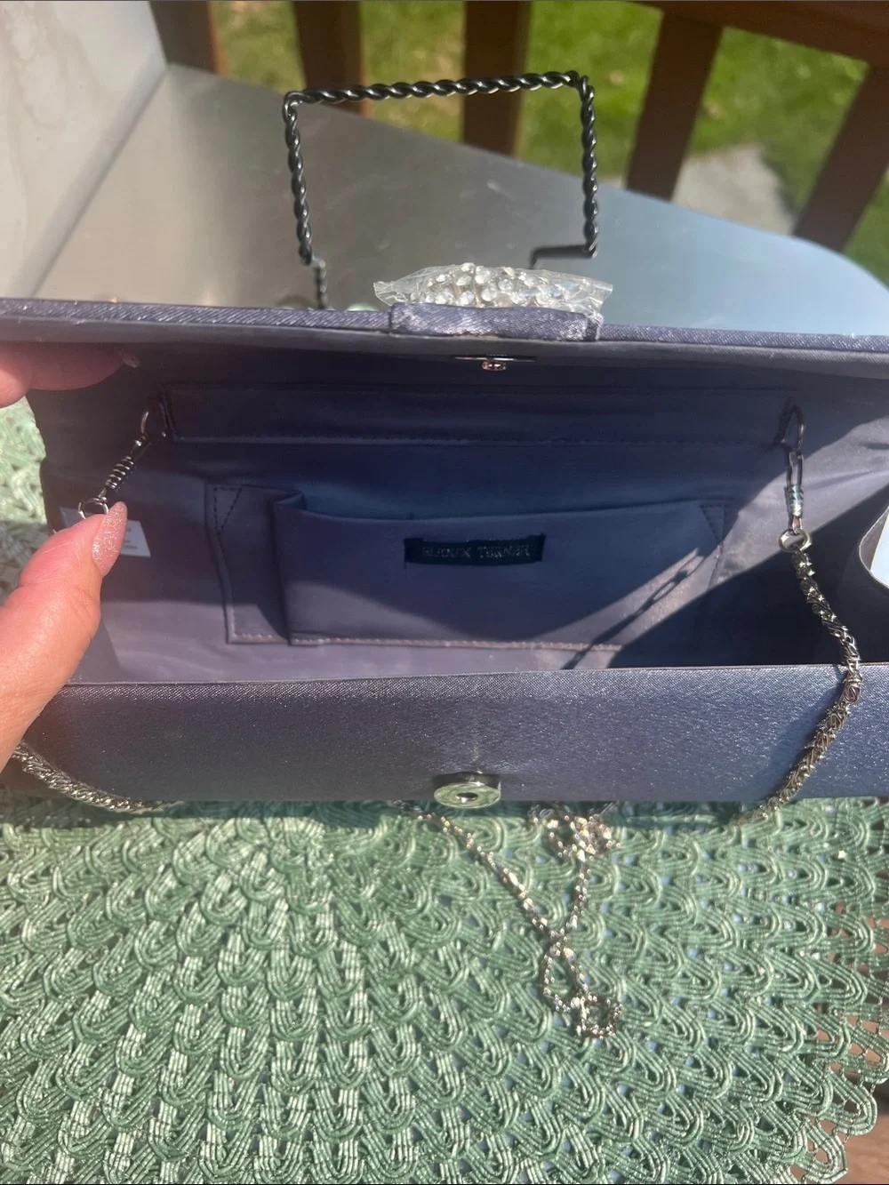 NWOT Gray Evening Clutch with clear crystal embellishment.